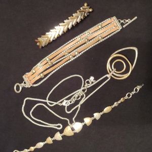 Multiple pieces of two toned Lucky Brand items